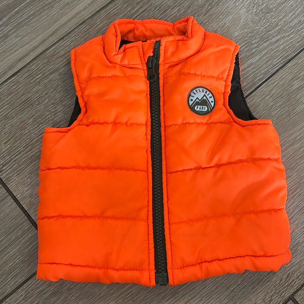Orange puffer vest